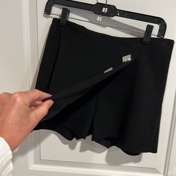 AKIRA skirt size M but fit S too velvety fabric with Rhine stones buttons. - Picture 2 of 3